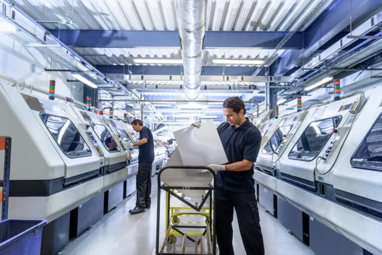Importivity agents inspecting production on the factory floor