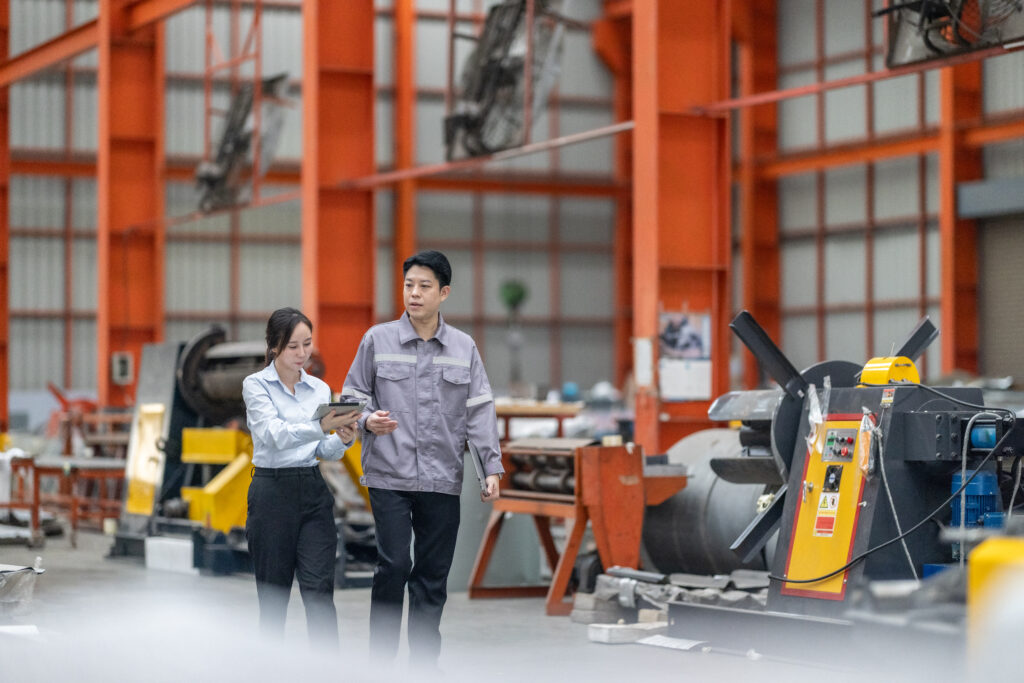 Importivity walking a manufacturing floor with a supplier